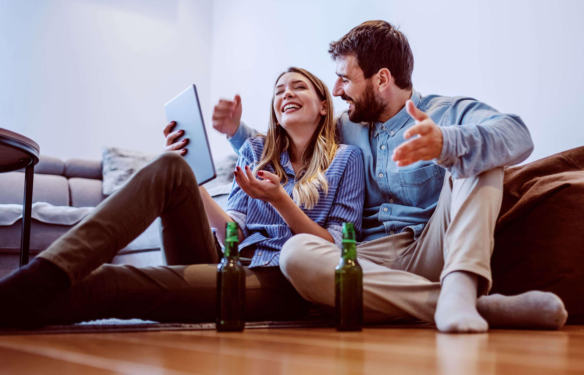 happy couple using high speed broadband